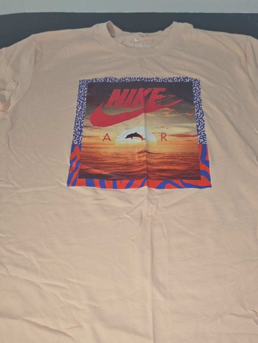 Nike Men's Peach Tee with Sunset Graphic and Red Logo